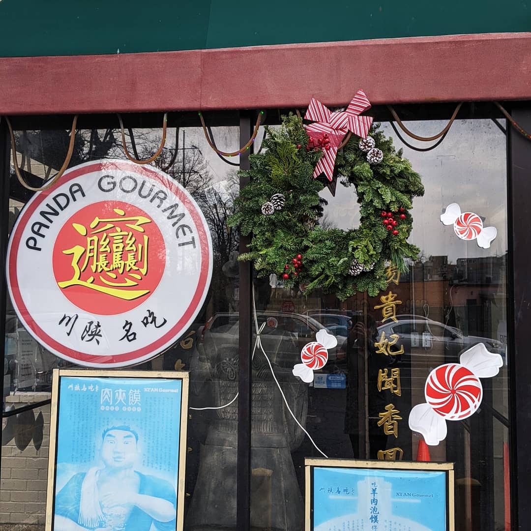 BladensburgRoad's tweet photo. This year we gave out free #Christmas decorations to some of our Main Street businesses to match our #PHM2020 theme: peppermints! Check out peppermint window decals &amp; wreaths with red and white striped bows at businesses like Panda Gourmet! #BladensburgRoad @SmallBizDC https://t.co/cXUlkwa6fr
