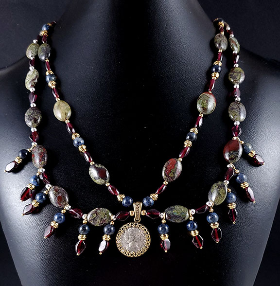 Roman Denarius, garnet and dragon blood jasper. Might tweak the length a bit.
