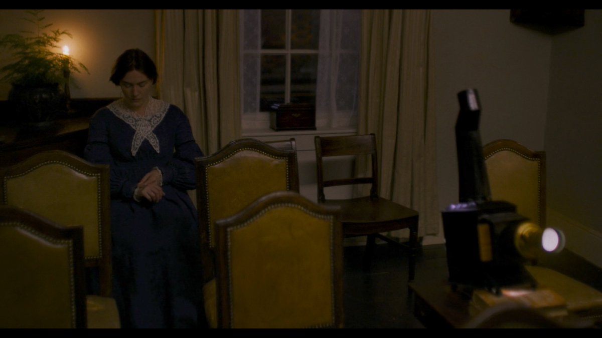 A scene of rising jealousy in  #Ammonite features a 19th century projector.Notably, the scientist's gaze never moves from the object of her envy. The projections of a machine fail to impress her. A body draws in the palaeontologist. Life, in its cruel beauty, is her focus.