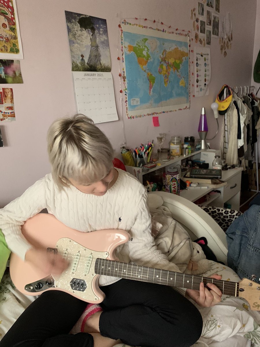 guys give me songs to learn on my new guitar i’m in love look how cute it is