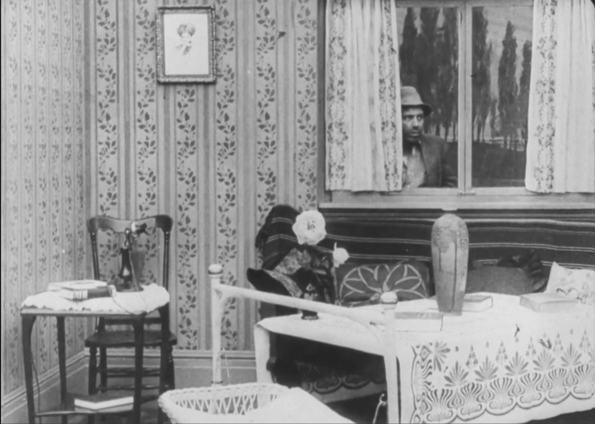 jseydl's tweet photo. Also, love the Arts &amp; Crafts set design -- is this a Rookwood vase? https://t.co/c1kHDZ5mzt