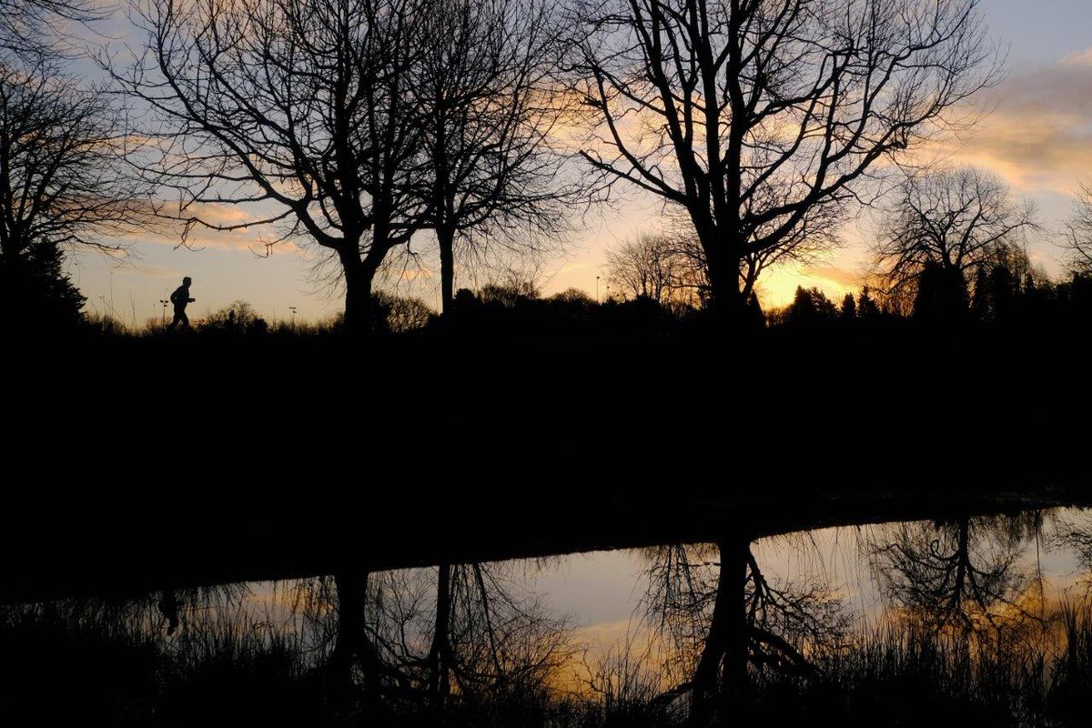 cjcallan333's tweet photo. On the eve of the #wintersolstice2020 an early morning jogger at #sunrise #clementwilsonpark #laganvalleyregionalpark #shawsbridge #belfast #lagantowpath @belfastcc @WeatherCee @angie_weather @newslineweather #landscapephotography #naturephotography #silhouette #treesofinstagram https://t.co/8xUDBKtA3N