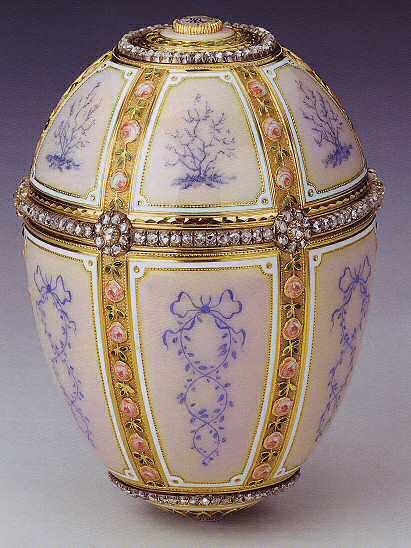 The egg was created by Peter Carl Faberge's workmaster, Michael Perkhin and is crafted of yellow gold, rose-cut diamonds, portrait diamonds, translucent pink en green enamel and opaque white enamel.