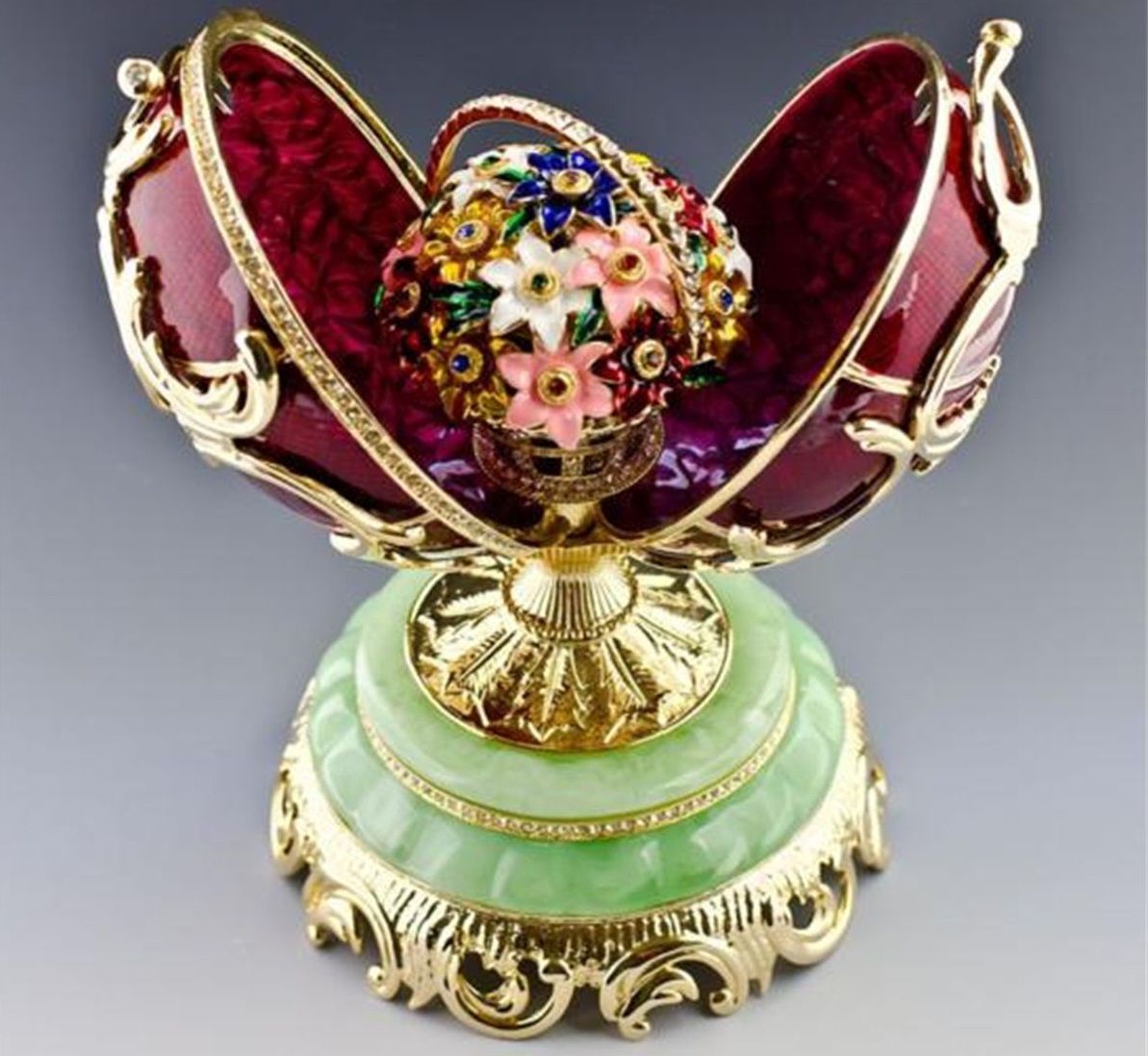 Its method of construction is noticeably sub par, having diamonds of mismatched size and with inferior quality attachments, and two halves that are asymmetrical, failings not characteristic of Fabergé's workshop.