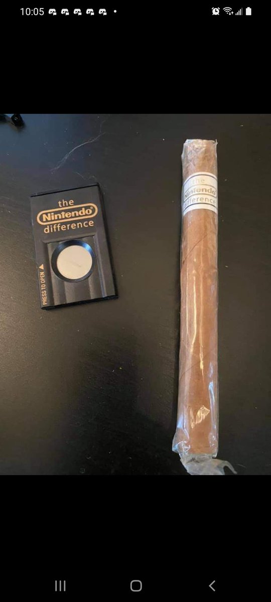 ArtofNP's tweet photo. This is not my item. But today I learned that Nintendo cigars are a thing that exist. And my life is forever changed. https://t.co/GcbnPoyJDm