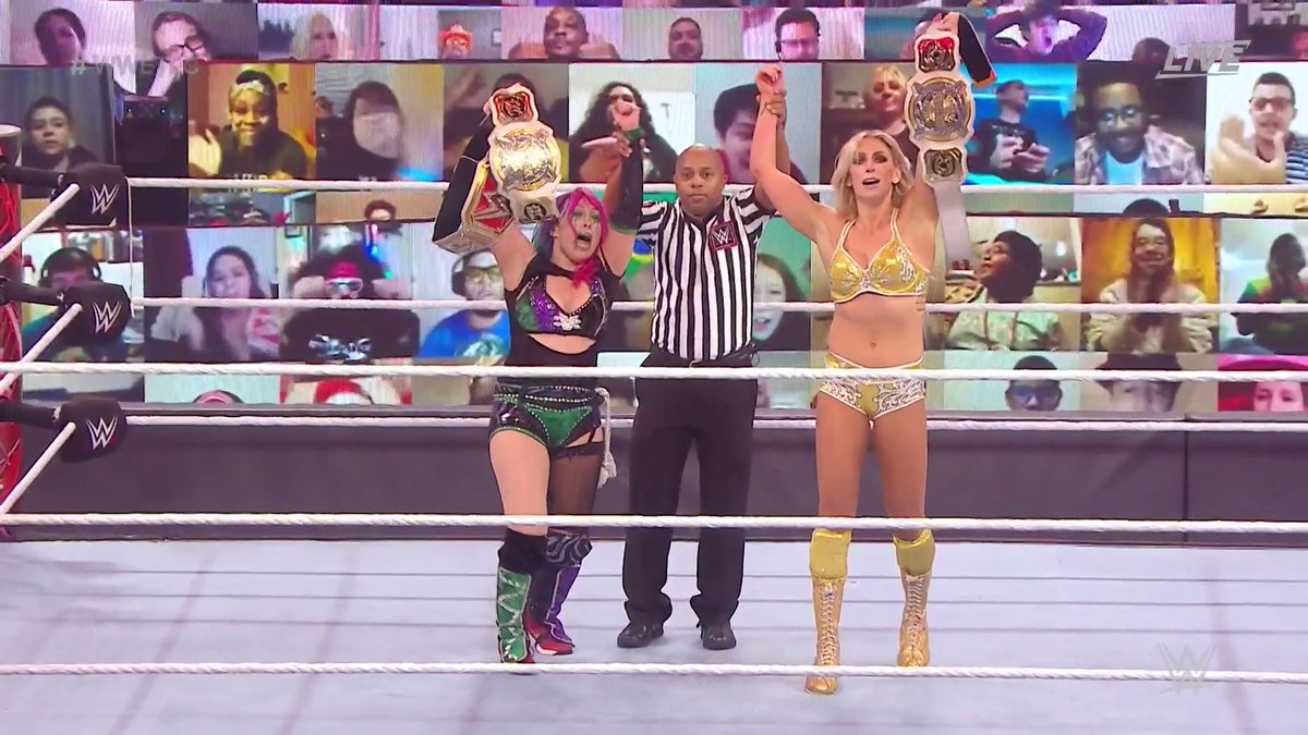 WWE's tweet photo. A ROYAL VICTORY!

@MsCharlotteWWE returns to win the WWE #WomensTagTitles with #WWERaw #WomensChampion @WWEAsuka! #WWETLC https://t.co/ojVaInJpkZ