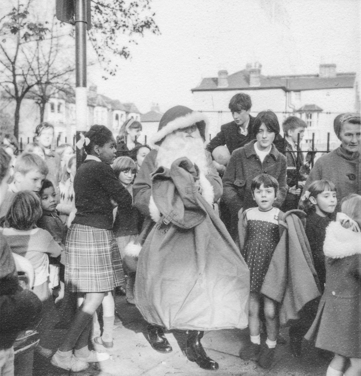 Father Christmas visits Peckham, 1966

#ArchiveAdventCalendar #HBAHFestivities #JonesAndHiggins #Peckham #Christmas #Santa #FatherChristmas #ChristmasPast #tbt