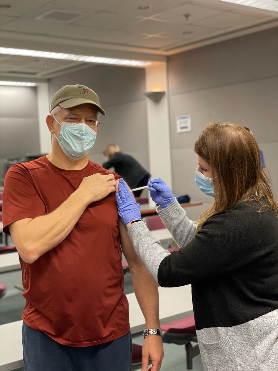 MosherSophie's tweet photo. My dad getting the COVID vaccine at the hospital where he works. 🎉 https://t.co/zS1c4Jzrbi