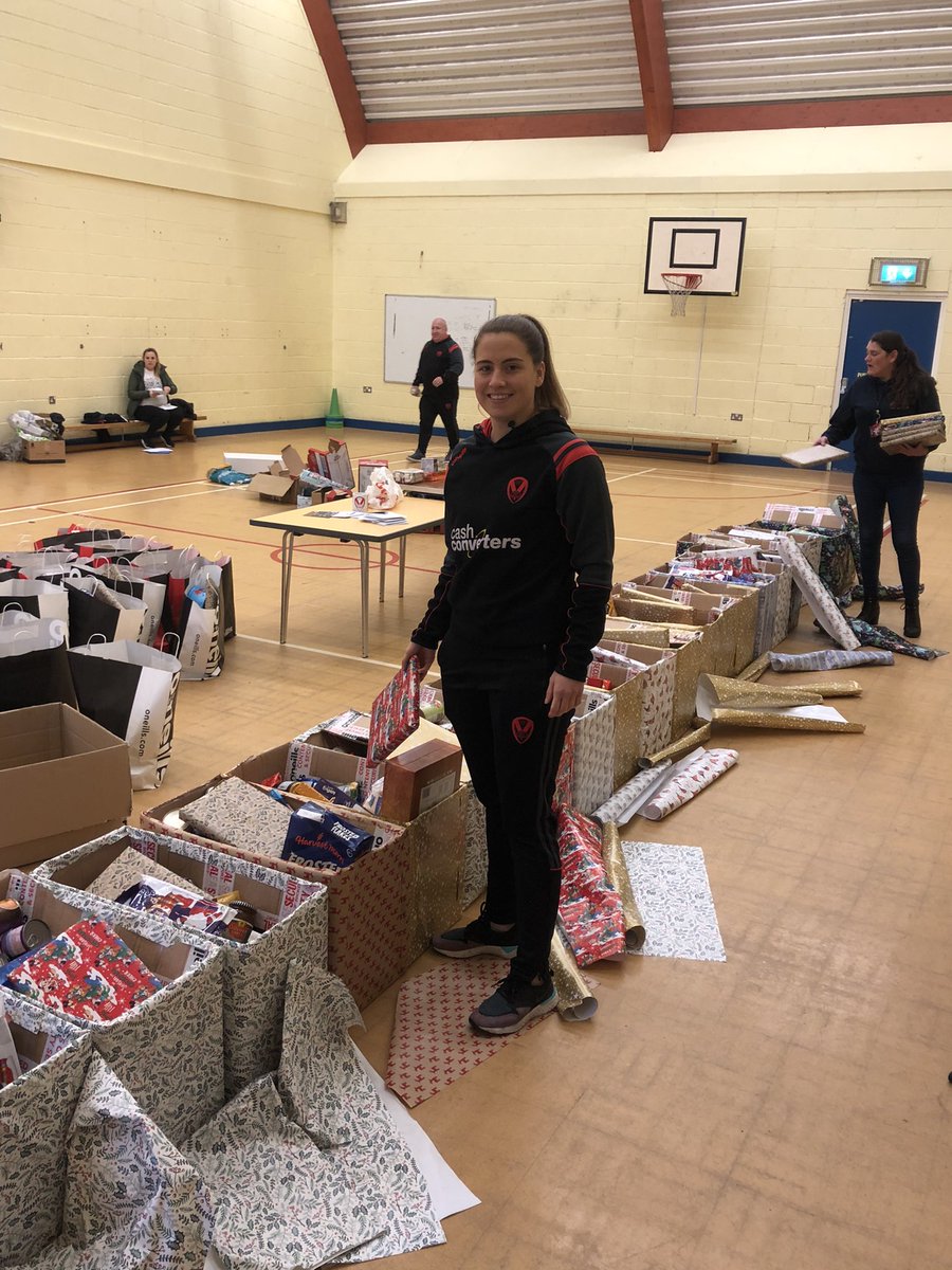 <a href="/Saints1890/">St.Helens R.F.C.</a> women’s player and England international <a href="/TaraJ_TJ/">Tara Jones MBE</a> has also joined in helping pack the food hampers!