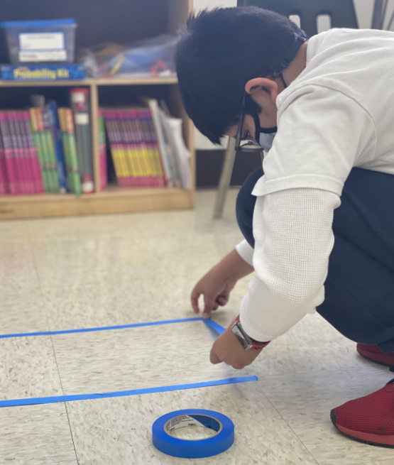 NAISNY's tweet photo. Year 5 are beginning their new unit of area and perimeter, by making and investigating shapes using the tiles on the floor! #teamwork #mathsisfun #howmanyways https://t.co/Uf1c0jvk6P