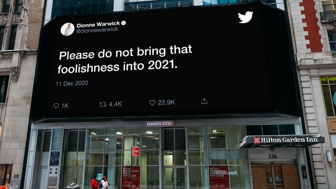 Tweet on an NYC billboard that reads “please do not bring that foolishness into 2021.”