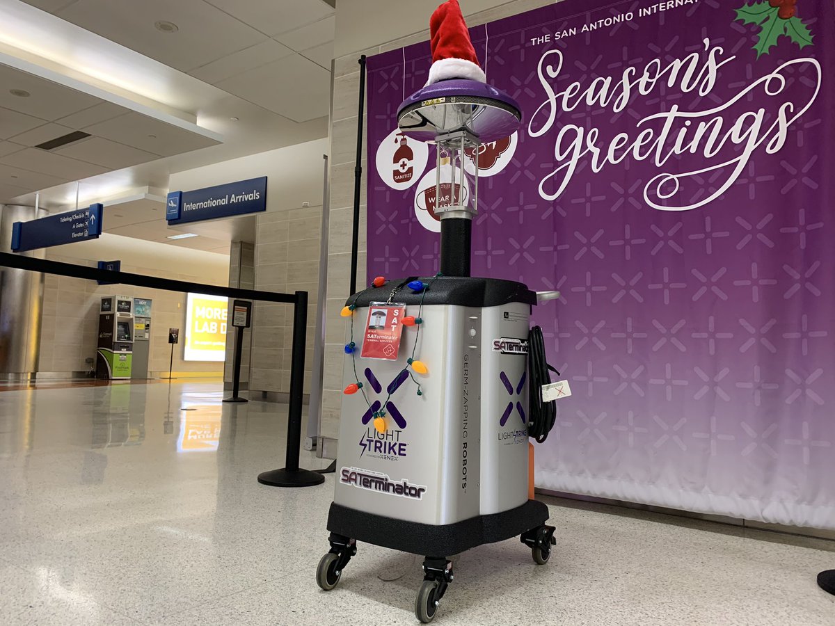 LeahDurain's tweet photo. Meet the SATerminator! This festive robot uses UV technology to disinfect spaces at @SATairport. #kens5eyewitness @KENS5 https://t.co/nsA3sifpBi
