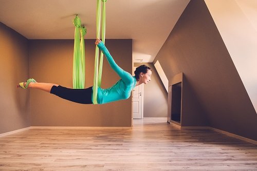7. Antigravity Yoga Ditch the mat and take yoga into the air with this aerial form. Test your limits by learning to hang suspended in the air with the support of a hammock and perform different asanas. It makes your body agile.