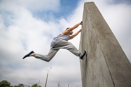 12. Parkour This workout is all about relying on your body weight and traversing a path that has several obstacles and includes climbing buildings and jumping from building to building... remember Channing Tatum in 22 Jump Street?