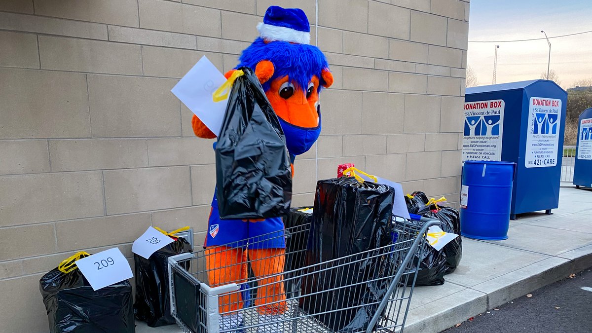 fccincinnati's tweet photo. With donations from the #FCCincy staff, @GaryFCCLion and friends were able to spread some holiday cheer and donate over 90 Christmas presents to families sponsored by @SVDPcincinnati. With the leftover monetary donations, an additional 25 gifts were donated to @CGMCincinnati. https://t.co/Z6Dqr4vZsv