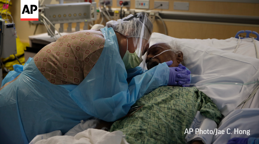 Romelia Navarro wept as she hugged her husband Antonio in his final moments at a COVID-19 unit in a Fullerton, California, hospital.

#APPhotos2020