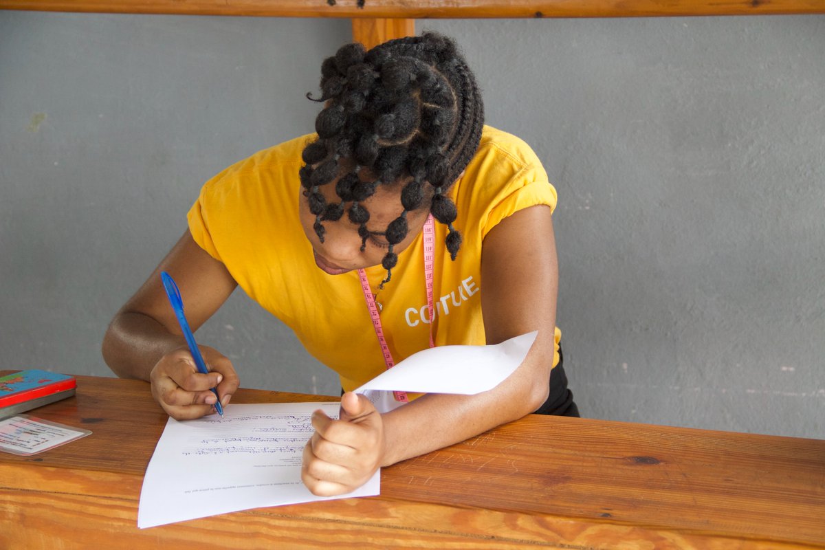 OrphanProject's tweet photo. #GOHaiti's Transition Academy students are putting their knowledge to the test before graduation! ✍��� Thanks to you, these young adults learned the #skills they need to #thrive in the real world. https://t.co/K3Jki1KJv1