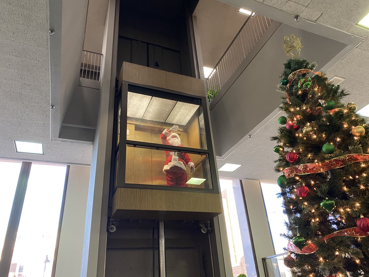 securitybankkc's tweet photo. The @Mix933 Secret Santa recipient was revealed today as Santa arrived at our #7thStBranch to join the morning show’s Teresa and Tara to share some holiday cheer with the winning family.🎄🎁#SBKCgivingback #HappyHolidays https://t.co/fAdiJuaqg7