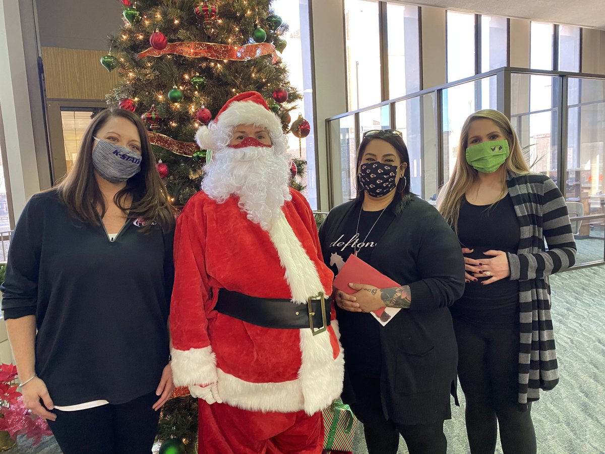 securitybankkc's tweet photo. The @Mix933 Secret Santa recipient was revealed today as Santa arrived at our #7thStBranch to join the morning show’s Teresa and Tara to share some holiday cheer with the winning family.🎄🎁#SBKCgivingback #HappyHolidays https://t.co/fAdiJuaqg7