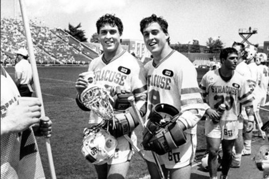 Two of the greatest — Gary and Paul Gait — celebrating a big  @CuseMLAX win. This morning I texted  @garygait to ask about the 103 patch and he said they wore it in memory of the Pan Am Flight 103 tragedy. I hit search...and saw it was on this day 32 yrs ago. I sat there...stunned.