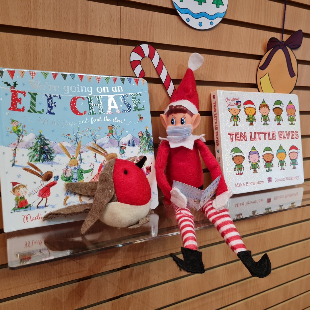 LibFalkirk's tweet photo. Christmas has come early for Elf N. Safety. The lovely #Falkirklibrary staff made a wee copy of "We're Going on an Elf Chase" by Martha Mumford and @Laura_A_Hughes so he could read it to pal Robin. ❤️ https://t.co/7JYBtyjYjO