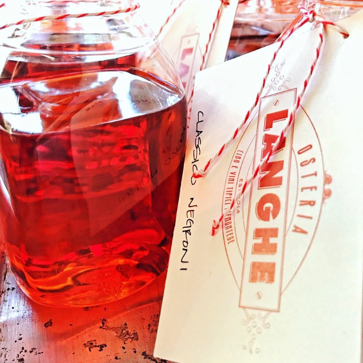 2021 is so close we can taste it... And it tastes ALMOST as good as our Negronis! Which you can order for pick-up on #NewYearsEve along with a fabulous feast of risotto, coniglio, beef wellington, &amp; so much more... Kiss 2020 goodbye like you mean it. ExploreTock.com/OsteriaLanghe #NYE