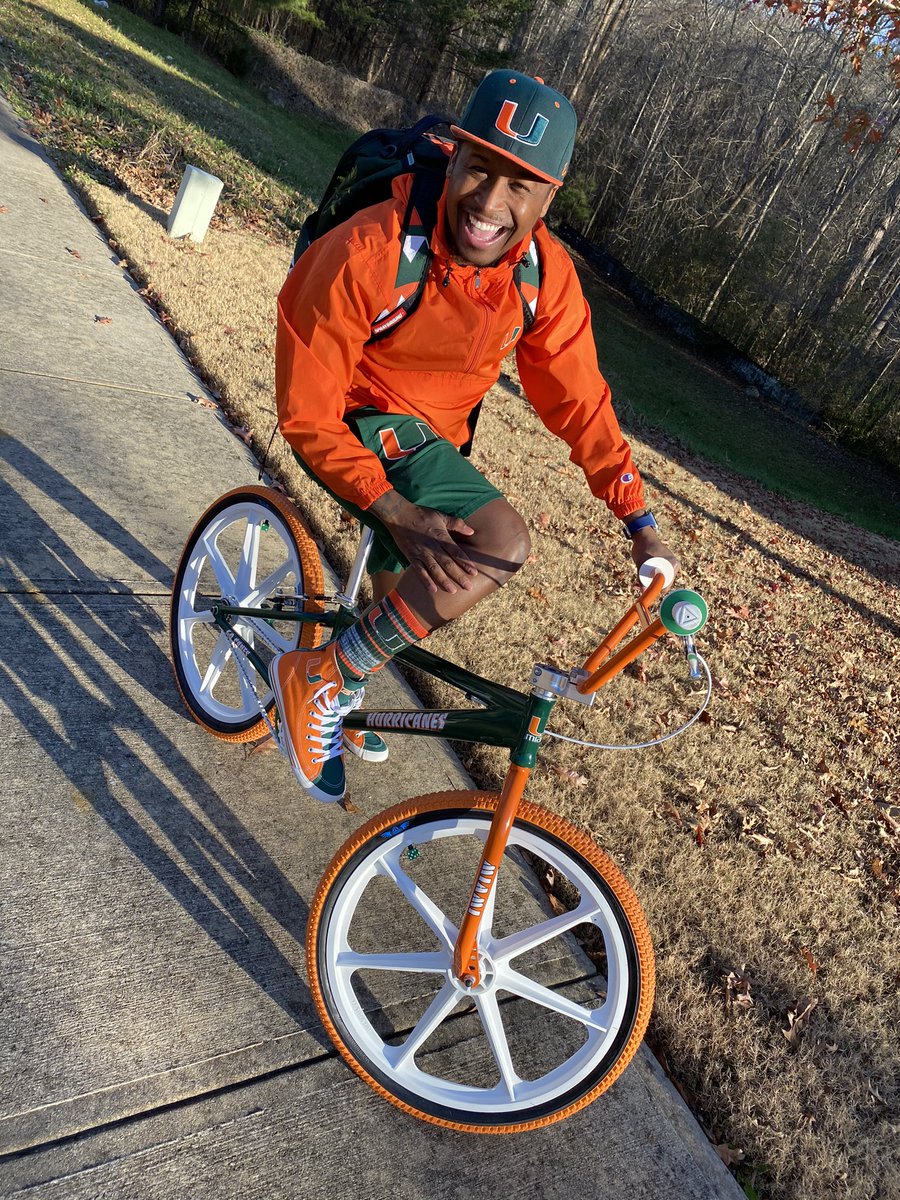FerrariSimmons's tweet photo. My New Toy! Thx #DJMars for my “Miami Hurricanes” custom BMX bike 🚲🙌🏾 #GoCanes 📷 Cred: Mrs Rari 🧡💚 https://t.co/MjBNGzirK9