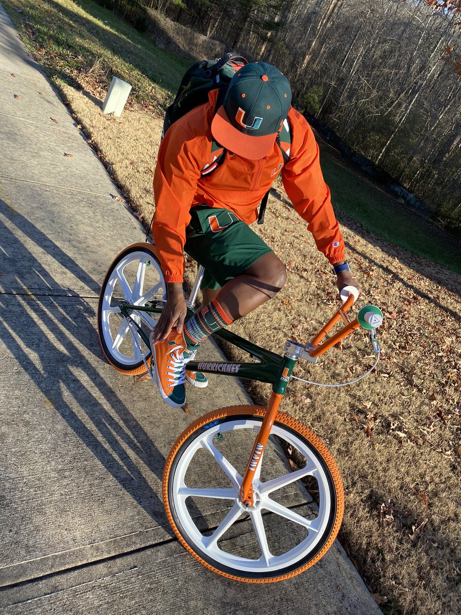 FerrariSimmons's tweet photo. My New Toy! Thx #DJMars for my “Miami Hurricanes” custom BMX bike 🚲🙌🏾 #GoCanes 📷 Cred: Mrs Rari 🧡💚 https://t.co/MjBNGzirK9