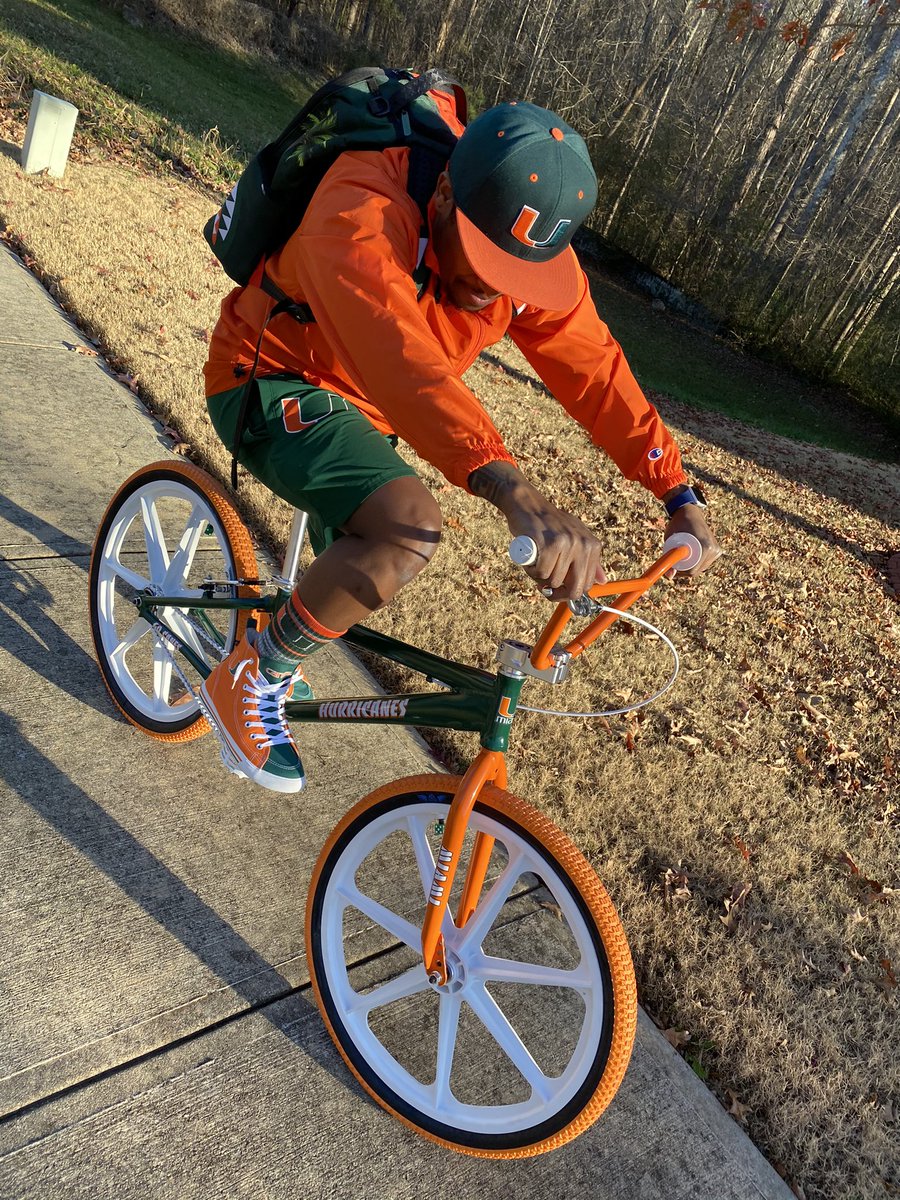 FerrariSimmons's tweet photo. My New Toy! Thx #DJMars for my “Miami Hurricanes” custom BMX bike 🚲🙌🏾 #GoCanes 📷 Cred: Mrs Rari 🧡💚 https://t.co/MjBNGzirK9