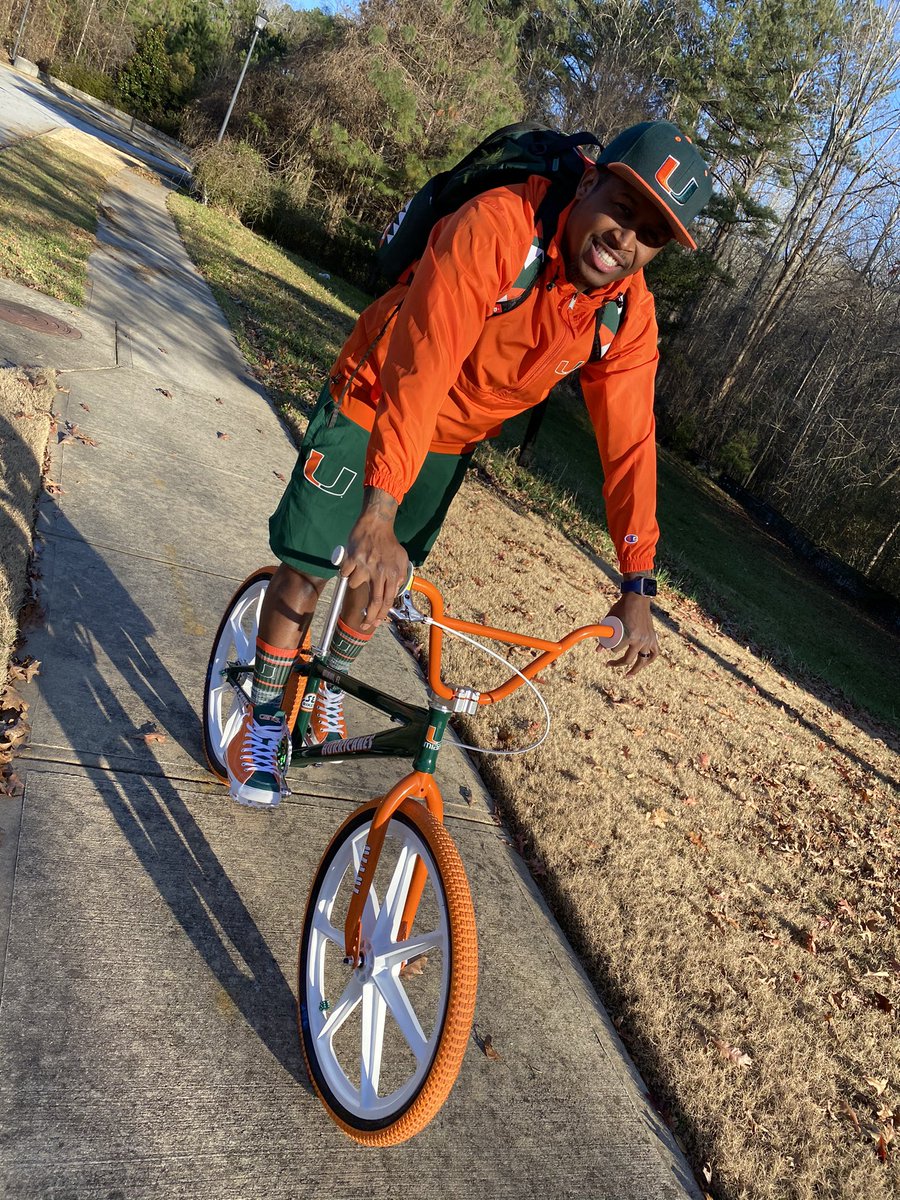 FerrariSimmons's tweet photo. My New Toy! Thx #DJMars for my “Miami Hurricanes” custom BMX bike 🚲🙌🏾 #GoCanes 📷 Cred: Mrs Rari 🧡💚 https://t.co/MjBNGzirK9