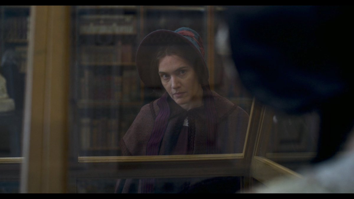 In  #Ammonite's last sequence, a much-ignored paleontologist views her first relic at the British Museum.She stares at it through the glass. Her former lover appears on the case's other side.Separated by glass, have they become relics to each other? Fossils of a past love?