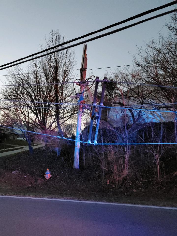 ErlangerFire's tweet photo. Richardson Road shut down currently from Turkeyfoot to Narrows Road due to multiple electrical poles snapped. No injuries. 1 driver was trapped but now is out. Owen Electric on scene. https://t.co/1BqYJrH0C5