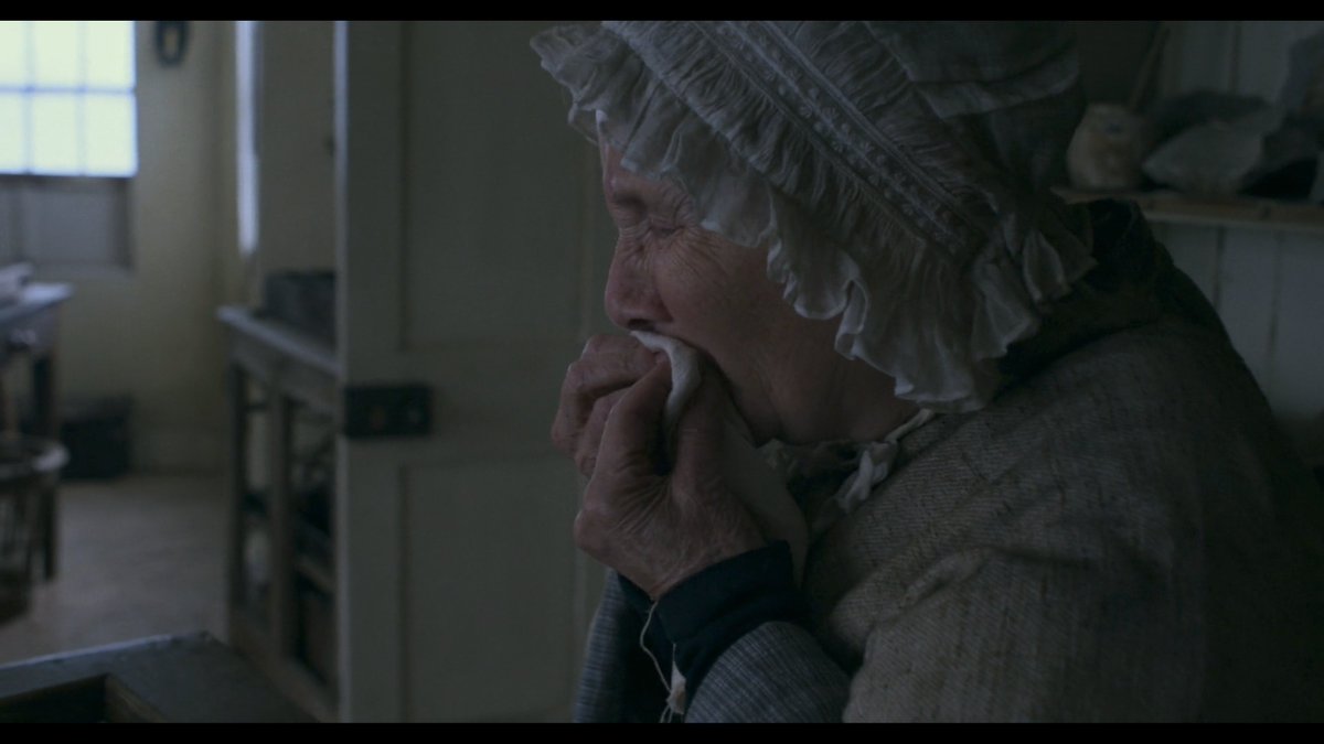 Metaphoric montage in  #Ammonite.1st sequence: an old woman coughs blood. She gets a letter that a husband has written to his wife who has begun an affair with a woman.2nd: wet, yonic rocks on beach. Is heternormative masculinity a sickness, drying out a natural femininity?