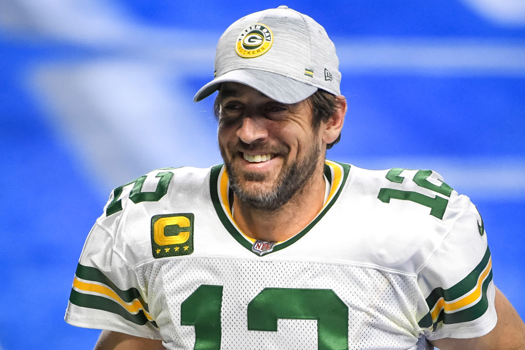 PFF's tweet photo. Aaron Rodgers: 14 games w/ a 100.0+ passer rating

Most ever in a single season 🏆 🔥 https://t.co/5BpvPpWr3h