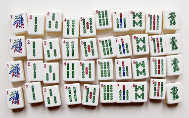 "it won't feel like another language"Yes, there is a suit of tiles with chinese characters counting 1-10 but you can buy sets with arabic numbers ("eNgLiSh NuMbErS" if that's what you think they are) and the rest of the tiles you can literally count at first glance like dominoes