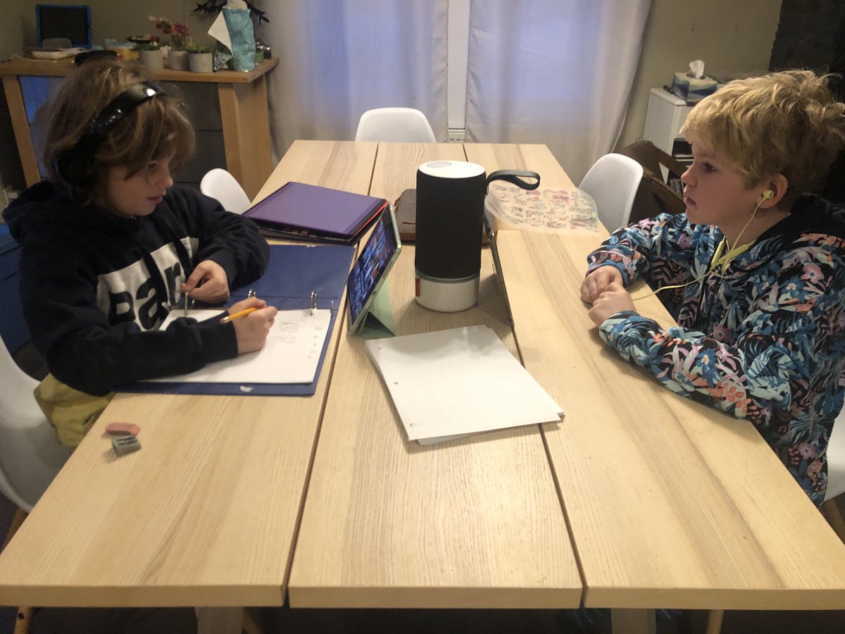 Two kids in headphones doing online learning, reminding me of how LOUD I used to sing listening to my Walkman on road trips. I imagined myself sitting at the table, doing my own work, but all I’ve done is google translated French, cleaned up cat puke and guzzled coffee.