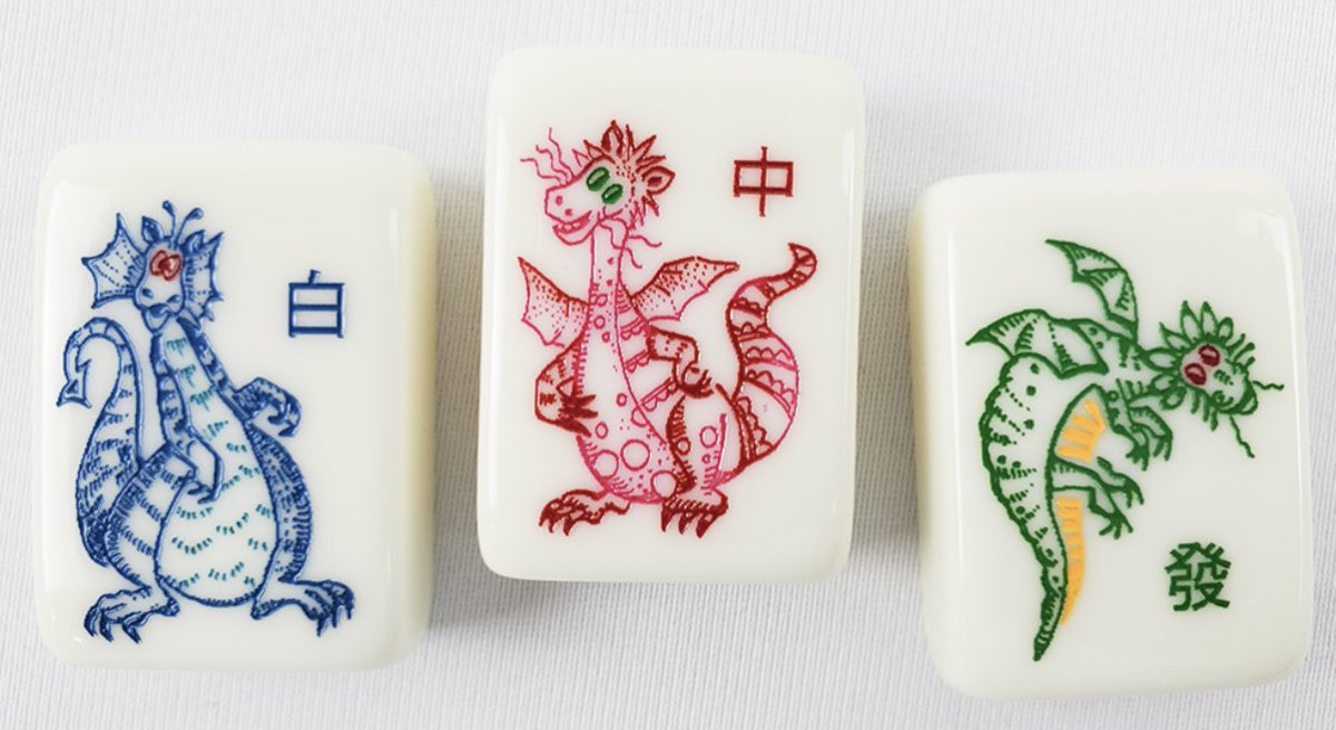 I'm also low key fascinated by these very non-Asian looking dragons showing up on these American made mahjong sets.I only know these tiles as 紅中 發財, so them being dragons is all new to me. It's one of the big early divergences in design, I think.
