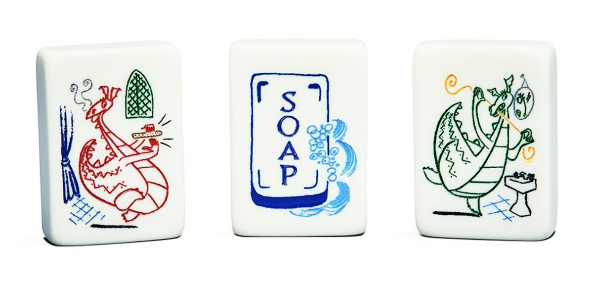 I'm also low key fascinated by these very non-Asian looking dragons showing up on these American made mahjong sets.I only know these tiles as 紅中 發財, so them being dragons is all new to me. It's one of the big early divergences in design, I think.