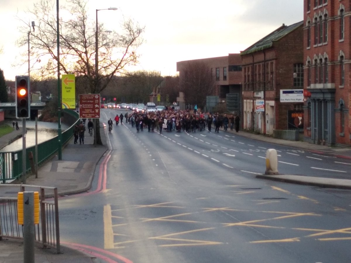 Police are here, bringing up the back of the march and blocking the road ahead. I think it is to control traffic but hard to tell because...