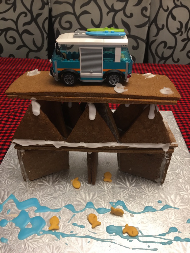 647GotCake's tweet photo. @skillsontario First and second weights going on my son's gingerbread bridge for the #WinterfestBridge STRONGEST bridge challenge (weight in grams).  #SkillsWinterfest2020 https://t.co/kGbLHDl0Xf
