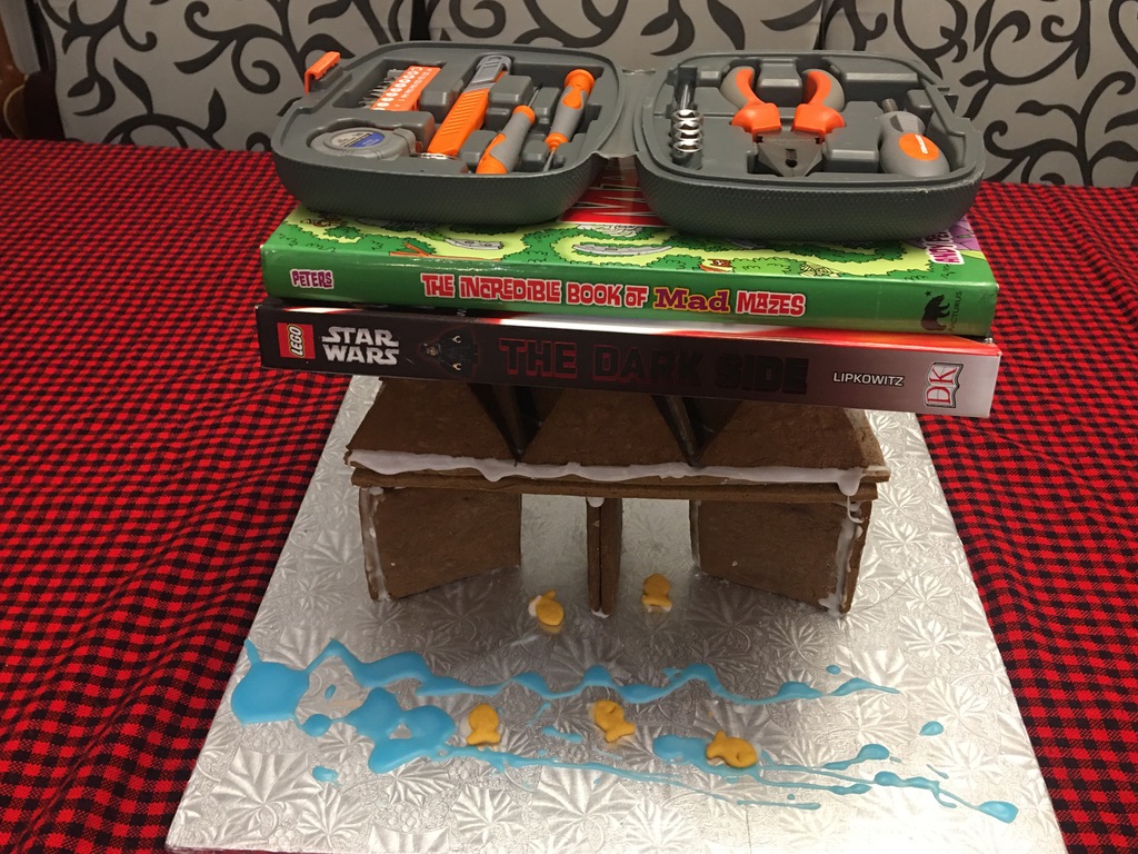 647GotCake's tweet photo. @skillsontario 5th and 6th weights going on my son's gingerbread bridge for the #WinterfestBridge STRONGEST bridge challenge (weight in grams).  #SkillsWinterfest2020 https://t.co/ZY5yAAK9vf