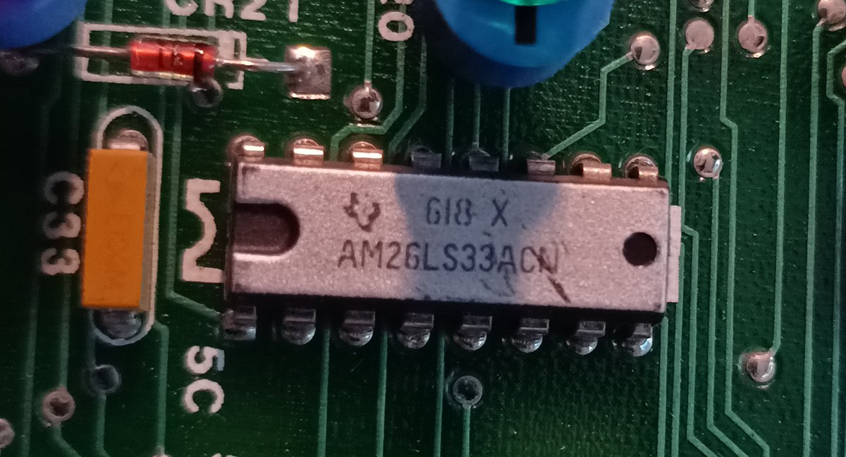 And this chip over here is an AM26LS33ACN, which is a Quadruple Differential Line Receiver.