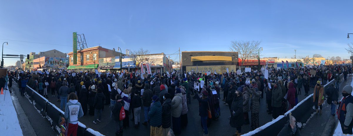 Crowd of over a thousand marching down Lake Street. One of the largest marches we’ve seen in quite some time. “No justice, no peace, prosecute the police.” Say his name: Dolal Idd”