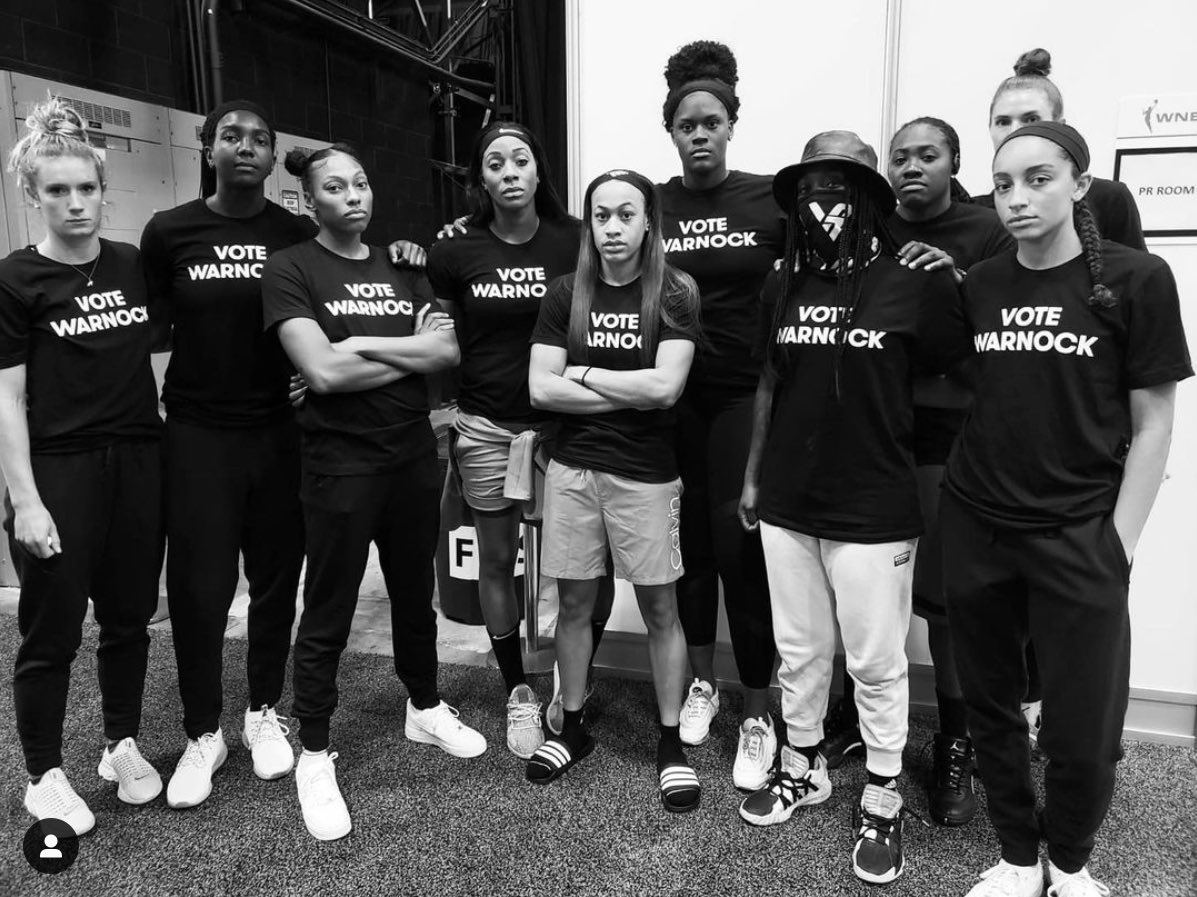 GreggHoush's tweet image. Kelly Loeffler’s (@KLoeffler) WNBA team Atlanta Dream wearing shirts promoting her opponent Warnock @ReverendWarnock.