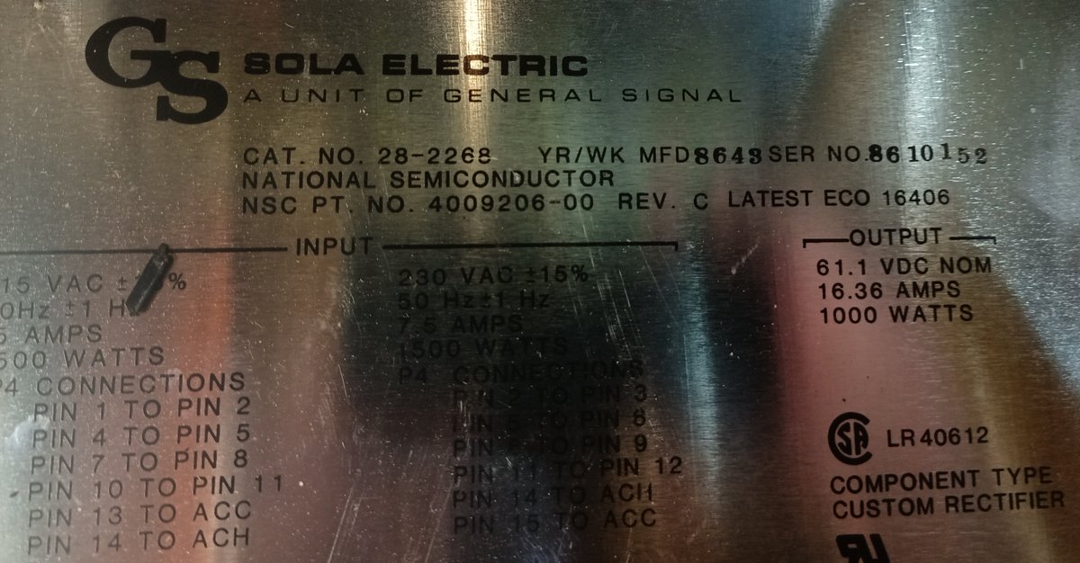 speaking of power... I took some more pictures of the power supply.The first power supply (which is the second part of the power distribution system) is this, a General Signal/Sola Electric 28-2268.It takes in AC power and produces 61.1 volts DC, at 16.36 amps.