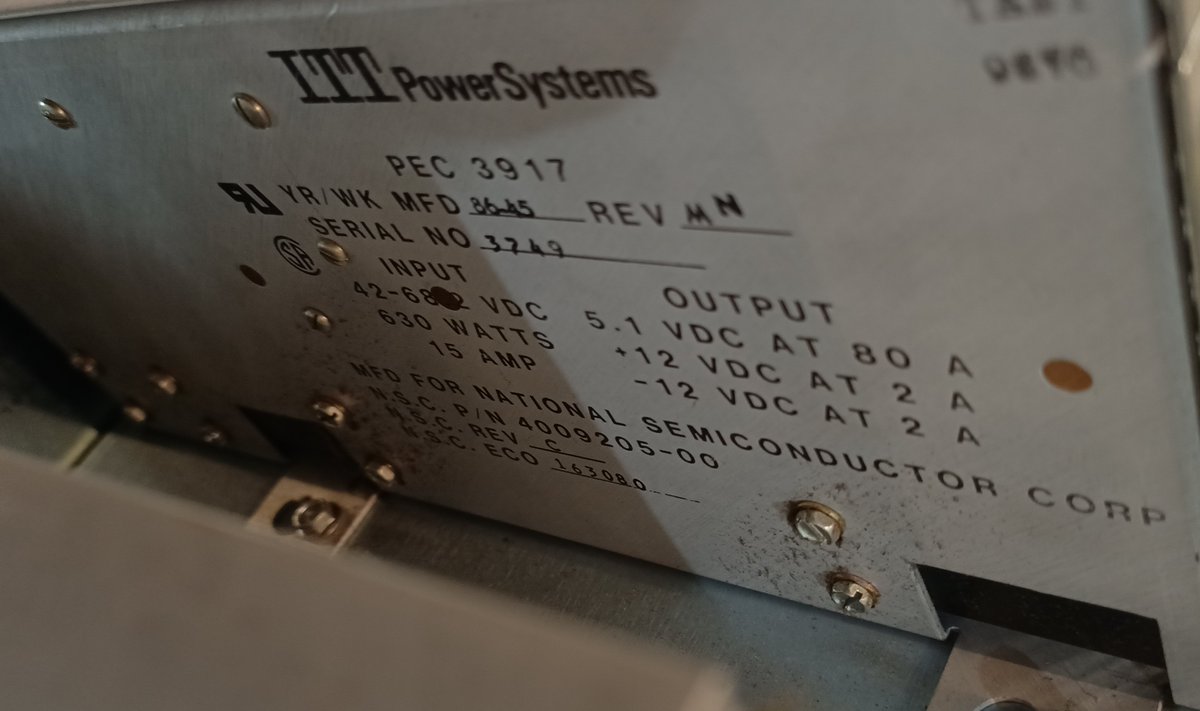 These are apparently custom-made for National Semiconductor by ITT PowerSystems. They take in 42-68 volts DC and convert it to the three voltages the computer uses:5.1v at 80 amps+12v at 2 amps-12v at 2 amps