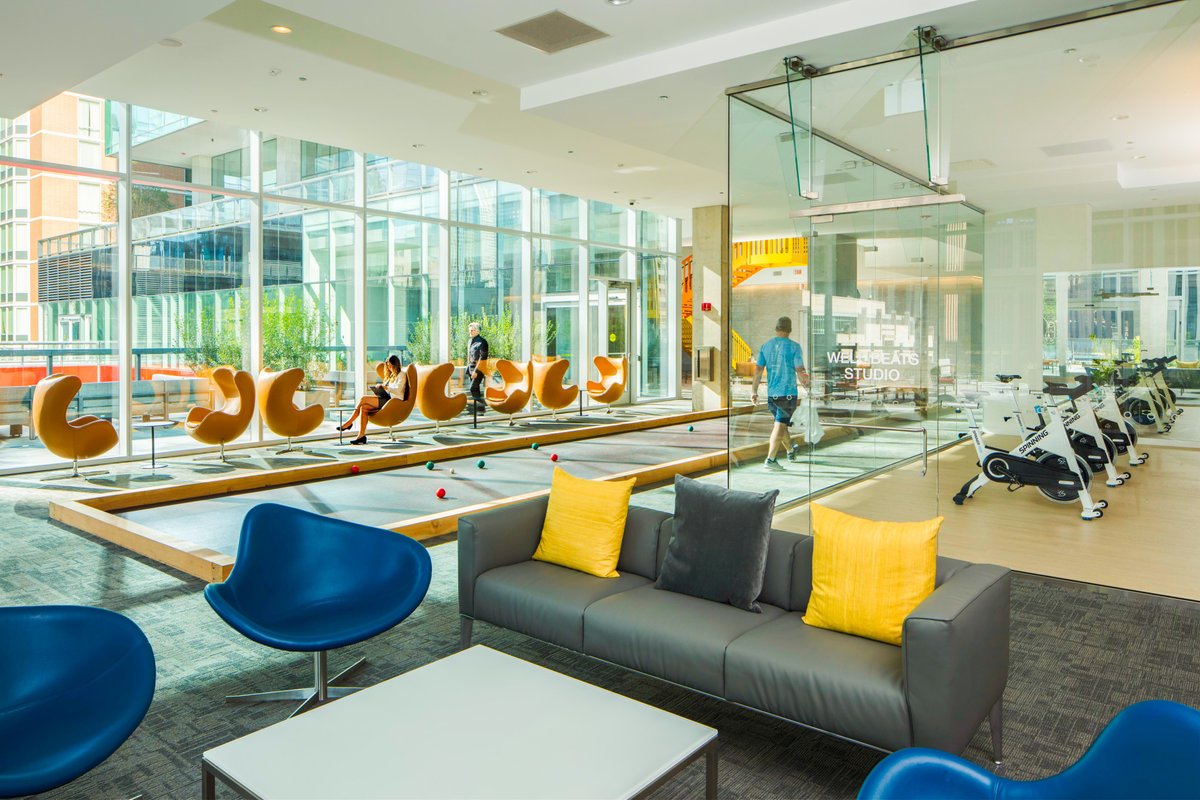OptimaSignature's tweet image. Living at Optima Signature means there's always something fun to do! Such a gorgeous shot of our 7th floor amenity space featuring our Bocce Ball Court, Well Beats Cycling Studio, and the Golf Simulator right behind us. 🙌🏻 #BeAnOriginal