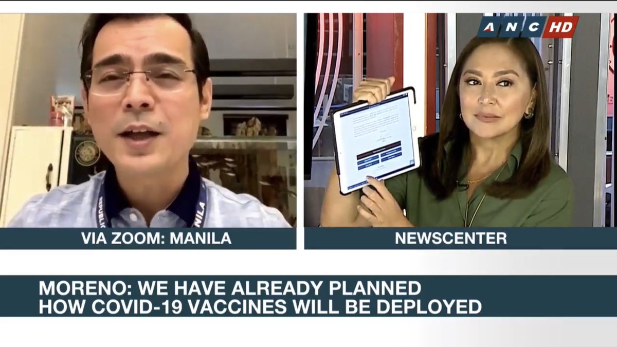 ManilaPIO's tweet photo. LOOK: ABS-CBN News anchor Karen Davila holds her tablet device up, showing the https://t.co/VpSKT9oUoU website where Manila City residents can register for the upcoming COVID-19 vaccine.

#AlertoManileno #COVID19PH https://t.co/fmdgg7T3NU