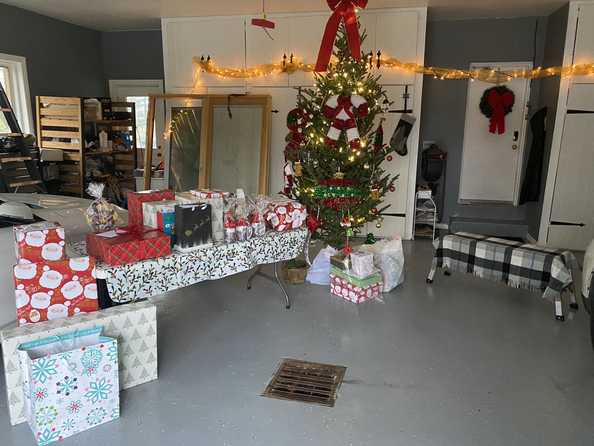 I’ll start us off with pictures of my first tobogganing in over a decade, a re-developed flower garden, a garage Christmas, and our new raised vegetable garden.