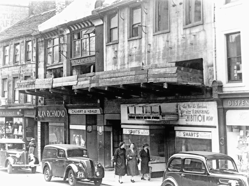 philmartin26's tweet image. A photograph taken from the old Town Hall in Market Square Lancaster during the 1950's, looking across at the shops.